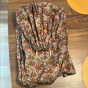 WildBird Floral Ring Sling with Red and Green Accents